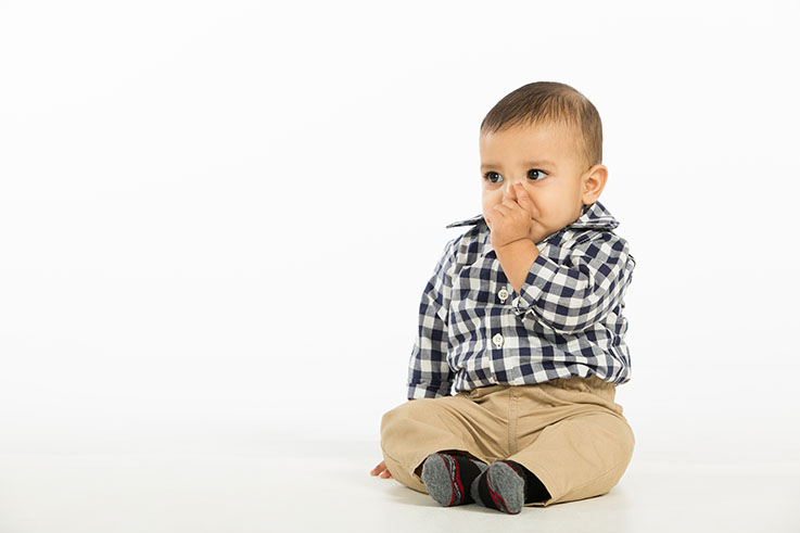 baby boy sucking thumb